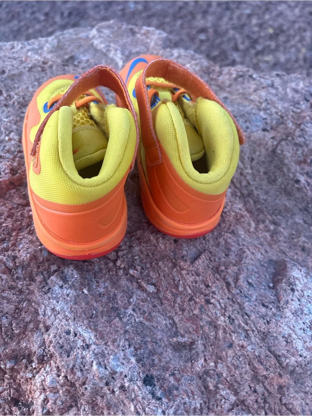 Nike Kids Orange and Yellow Hook-and-Loop Sneakers with Blue Swoosh